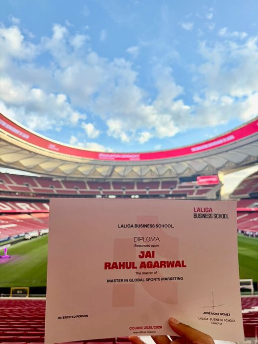 Jai Agarwal’s LaLiga Business School diploma, Master in Global Sports Marketing, held up at the ceremony