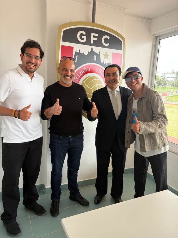 Jai Agarwal with three others beside the Guarda FC crest